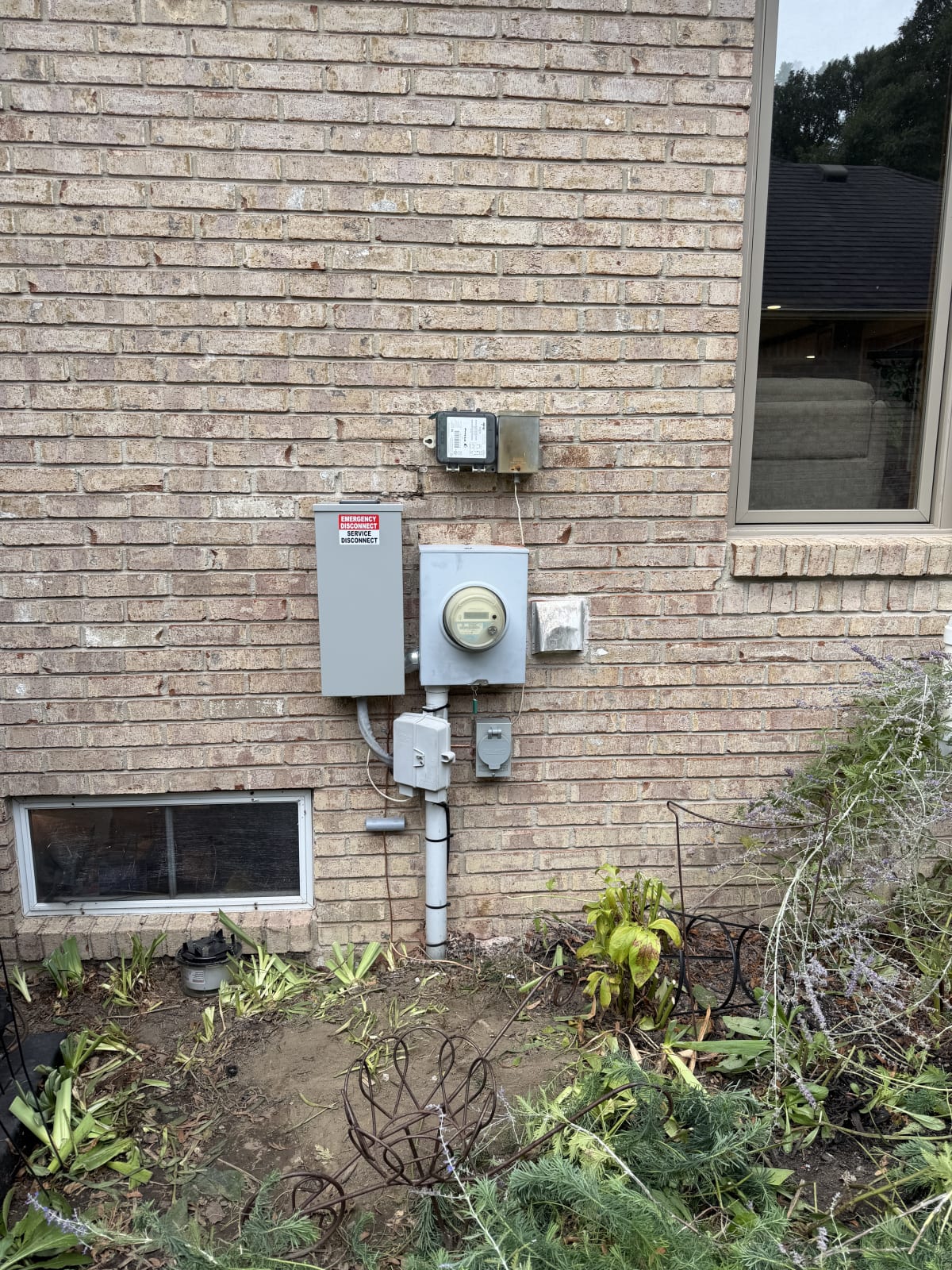 New outdoor emergency service disconnect installed on a Macomb, Michigan home as required by Michigan's electrical code